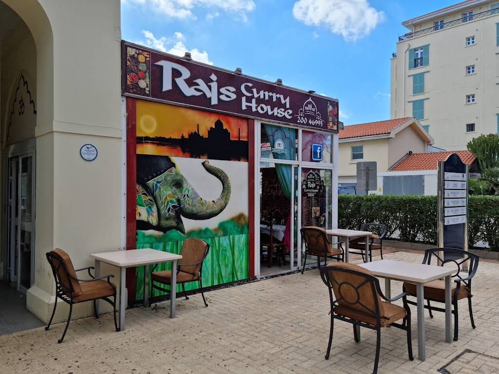 Raj's Curry House — colourful exterior with hand-painted elephant mural